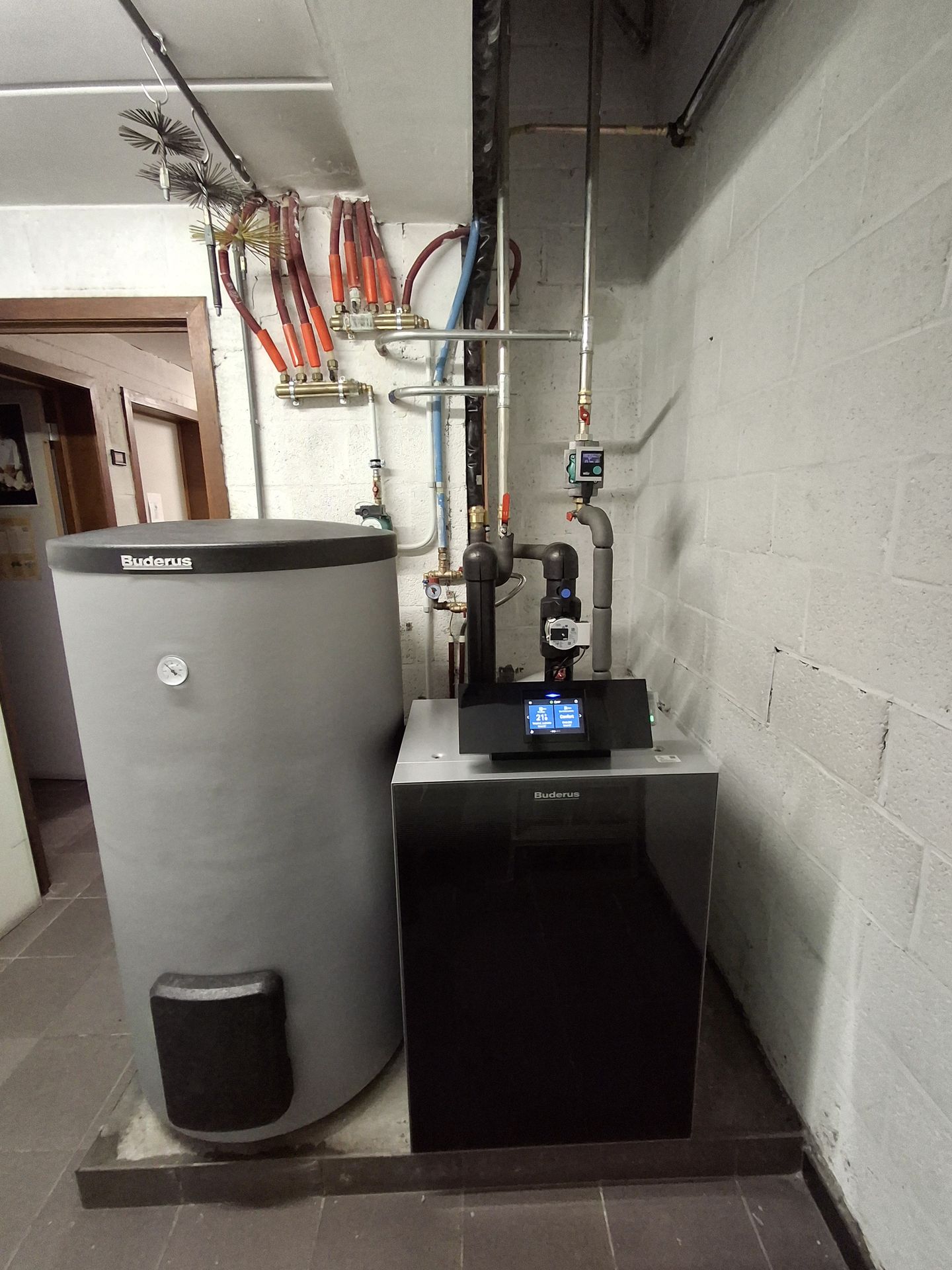 Buderus KB192i.2 condensing boiler and Logalux tank in the boiler room